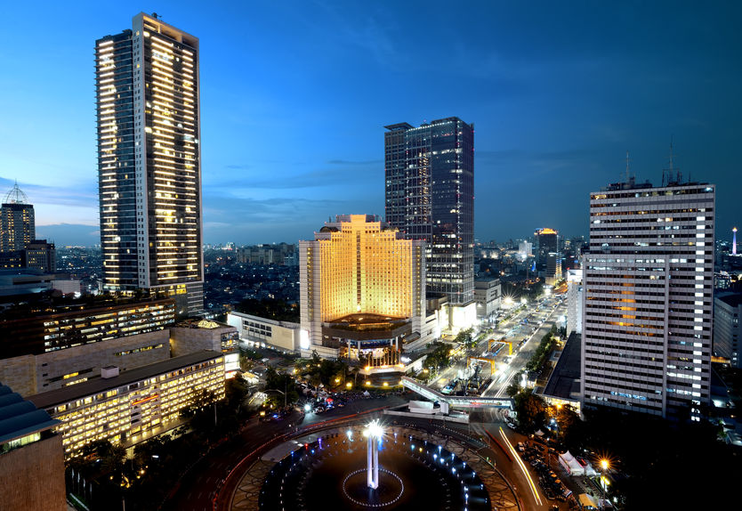 51513587 - jakarta city at night with modern building